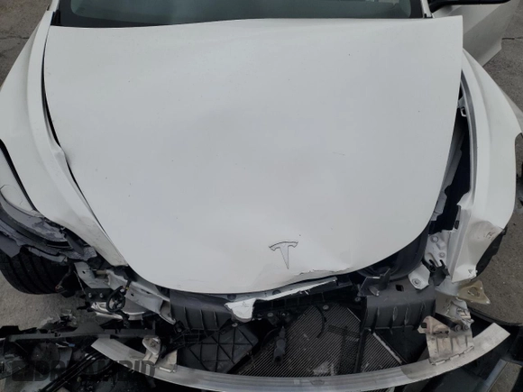 2023 Tesla Model 3 z VIN 5YJ3E1EA1PF561521, wystawiony jako Copart lot #55637855 z przebiegiem 83 008 mil mil oraz Szkoda całkowita • Salvage title. Historia ofert i sprzedaży dostępna na DreamBid. Obrazek 11.