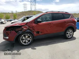 2016 Ford Escape SE z VIN 1FMCU9G9XGUC27074, wystawiony jako Copart lot #55788625 z przebiegiem 106 990 mil mil oraz Szkody całkowita. Historia ofert i sprzedaży dostępna na DreamBid. Obrazek 1.
