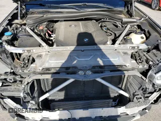 2021 BMW X4 M40i with VIN 5UX2V5C06M9E04443, listed as a Copart auction lot 72061194 with 71,637 mi miles and Salvage title. Bid and sale history available at DreamBid. Image 12.