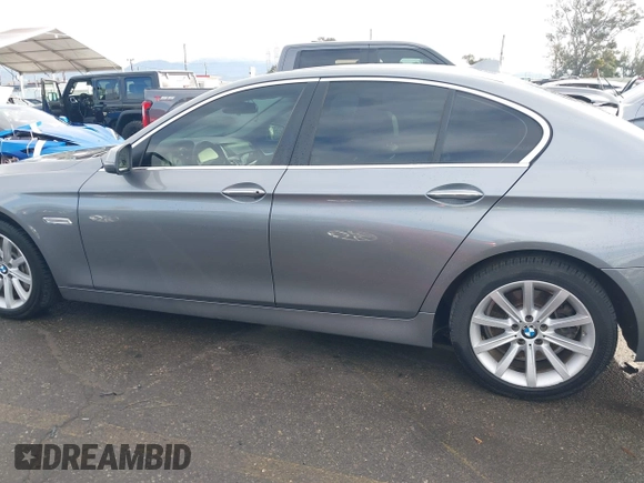 2014 BMW 5 Series 535d with VIN WBAXA5C50ED689048, listed as a IAAI auction lot 41430065 with 202,848 mi miles and . Bid and sale history available at DreamBid. Image 14.