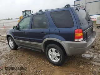 2002 Ford Escape XLT Choice with VIN 1FMYU04182KD34094, listed as a Copart auction lot 57299225 with 154,784 mi miles and Salvage title. Bid and sale history available at DreamBid. Image 2.