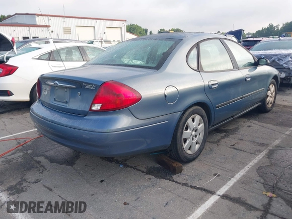 2001 Ford Taurus LX with VIN 1FAFP52U01A177636, listed as a IAAI auction lot 42494866 with 71,718 mi miles and . Bid and sale history available at DreamBid. Image 4.