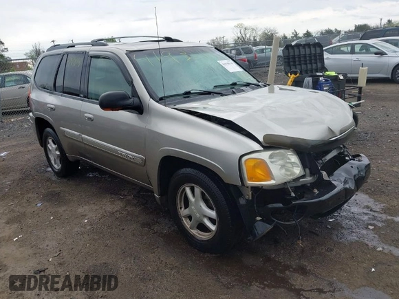 2003 GMC Envoy SLE with VIN 1GKDT13S932108979, listed as a IAAI auction lot 41938118 with 1 mi miles. Bid and sale history available at carsss.com. Image 1.