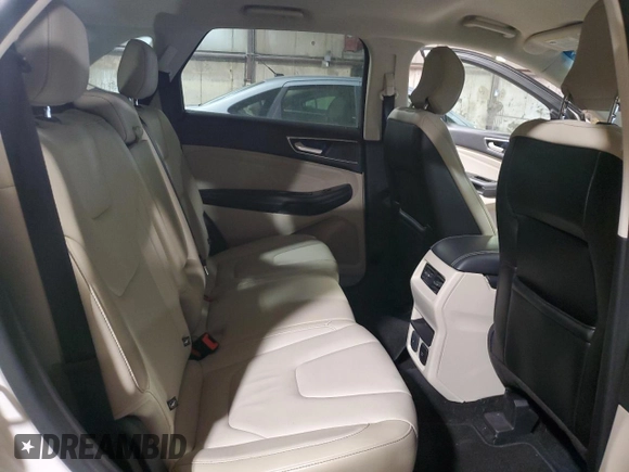 2015 Ford Edge Titanium z VIN 2FMTK3K91FBB08263, wystawiony jako Copart lot #55448405 z przebiegiem 135 788 mil mil oraz Szkoda całkowita • Salvage title. Historia ofert i sprzedaży dostępna na DreamBid. Obrazek 11.