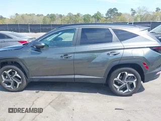 2022 Hyundai Tucson SEL z VIN 5NMJCCAE4NH096813, wystawiony jako IAAI lot #41899641 z przebiegiem 23 668 mil mil oraz . Historia ofert i sprzedaży dostępna na DreamBid. Obrazek 15.