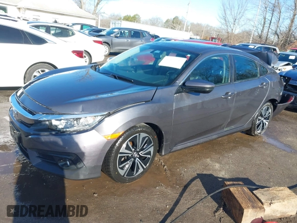 2017 Honda Civic Sedan EX-L with VIN 2HGFC1F70HH633263, listed as a IAAI auction lot 41511642 with 65,769 mi miles. Bid and sale history available at carsss.com. Image 2.