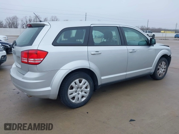 2014 Dodge Journey SE Plus with VIN 3C4PDCAB1ET181480, listed as a IAAI auction lot 41441341 with 189,641 mi miles and . Bid and sale history available at DreamBid. Image 4.