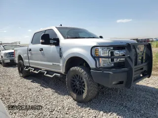 2019 Ford F-250 XL with VIN 1FT7W2BT0KEC17148, listed as a Copart auction lot 61570235 with 101,065 mi miles and Salvage title. Bid and sale history available at DreamBid. Image 4.