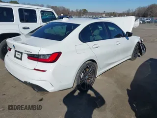 2021 BMW 3 Series 330e with VIN 3MW5P7J02M8C14862, listed as a IAAI auction lot 41154164 with 1 mi miles. Bid and sale history available at carsss.com. Image 4.