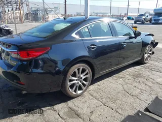 2015 Mazda 6 i Grand Touring with VIN JM1GJ1W61F1165006, listed as a IAAI auction lot 41988778 with 113,226 mi miles and . Bid and sale history available at carsss.com. Image 4.