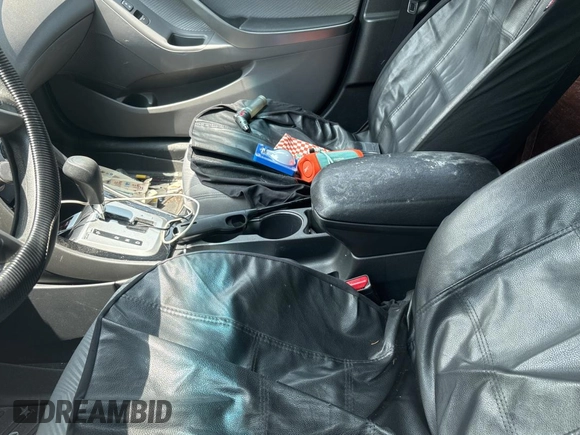 2012 Hyundai Elantra Limited z VIN KMHDH4AE6CU422133, wystawiony jako Copart lot #61023095 z przebiegiem 141 500 mil mil oraz Czysty tytuł • Clean title. Historia ofert i sprzedaży dostępna na DreamBid. Obrazek 8.