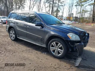 2012 Mercedes-Benz GL-Class GL 450 with VIN 4JGBF7BE8CA785757, listed as a IAAI auction lot 41415970 with 116,828 mi miles. Bid and sale history available at carsss.com. Image 1.