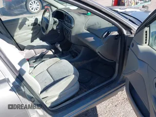 1999 Ford Contour SE Fleet z VIN 1FAFP66L7XK115659, wystawiony jako IAAI lot #42142065 z przebiegiem 161 018 mil mil oraz . Historia ofert i sprzedaży dostępna na DreamBid. Obrazek 5.