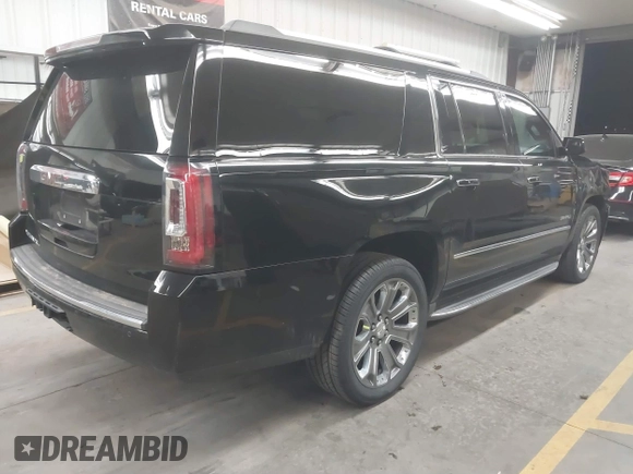 2016 GMC Yukon XL Denali with VIN 1GKS2HKJ8GR102213, listed as a IAAI auction lot 41818737 with 154,607 mi miles and . Bid and sale history available at DreamBid. Image 4.
