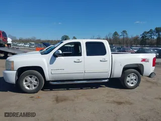 2010 Chevrolet Silverado 1500 LT with VIN 3GCRKSE35AG262187, listed as a IAAI auction lot 41883053 with 156,505 mi miles. Bid and sale history available at carsss.com. Image 14.