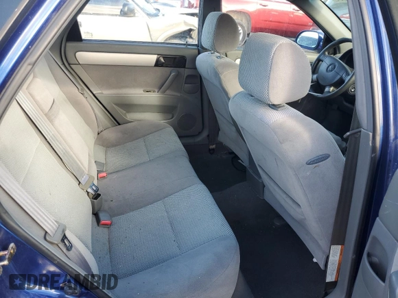 2006 Suzuki Forenza z VIN KL5JD56Z96K478173, wystawiony jako Copart lot #87059644 z przebiegiem 234 059 mil mil oraz Szkoda całkowita • Salvage title. Historia ofert i sprzedaży dostępna na DreamBid. Obrazek 10.