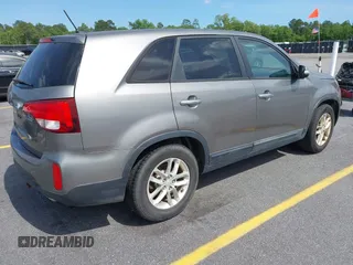 2014 Kia Sorento LX with VIN 5XYKT3A60EG486699, listed as a IAAI auction lot 42143270 with 127,190 mi miles and . Bid and sale history available at DreamBid. Image 4.