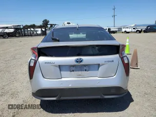 2018 Toyota Prius Two z VIN JTDKARFU3J3550801, wystawiony jako Copart lot #57625935 z przebiegiem 48 502 mil mil oraz Szkoda całkowita • Salvage title. Historia ofert i sprzedaży dostępna na DreamBid. Obrazek 6.