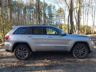 2016 Jeep Grand Cherokee Limited 75th Anniversary with VIN 1C4RJFBT9GC400873, listed as a IAAI auction lot 41834112 with 110,457 mi miles and . Bid and sale history available at DreamBid. Image 13.