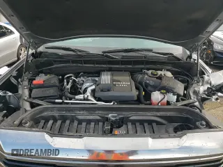 2023 GMC Sierra 1500 AT4 with VIN 1GTUUEE83PZ302793, listed as a Copart auction lot 65083345 with 65,112 mi miles and Salvage title. Bid and sale history available at DreamBid. Image 13.