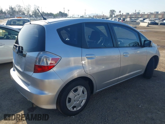 2013 Honda Fit with VIN JHMGE8H39DC055353, listed as a IAAI auction lot 41986501 with 159,569 mi miles. Bid and sale history available at carsss.com. Image 4.