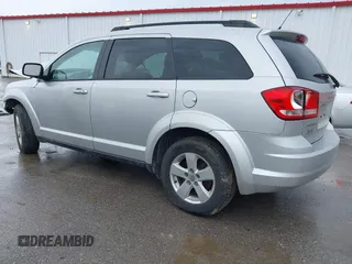 2013 Dodge Journey Canada Value z VIN 3C4PDCABXDT563439, wystawiony jako IAAI lot #42227899 z przebiegiem 213 199 mil mil oraz . Historia ofert i sprzedaży dostępna na DreamBid. Obrazek 3.