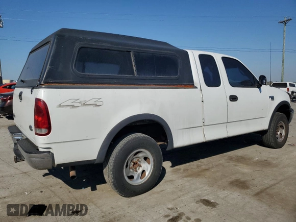 2000 Ford F-150 XL with VIN 1FTRX18W2YNC34320, listed as a Copart auction lot 77832404 with 217,448 mi miles and Clean Title. Bid and sale history available at carsss.com. Image 3.