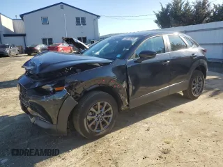 2024 Mazda CX-30 S with VIN 3MVDMBAM0RM635991, listed as a Copart auction lot 48979595 with 11,640 mi miles and Salvage title. Bid and sale history available at DreamBid. Image 1.