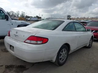 2000 Toyota Solara SE with VIN 2T1CG22P1YC376934, listed as a IAAI auction lot 42115010 with 127,337 mi miles. Bid and sale history available at carsss.com. Image 4.