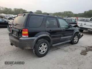 2005 Ford Escape XLT with VIN 1FMYU931X5KD14729, listed as a Copart auction lot 71127464 with 0 mi miles and Salvage Title. Bid and sale history available at carsss.com. Image 3.