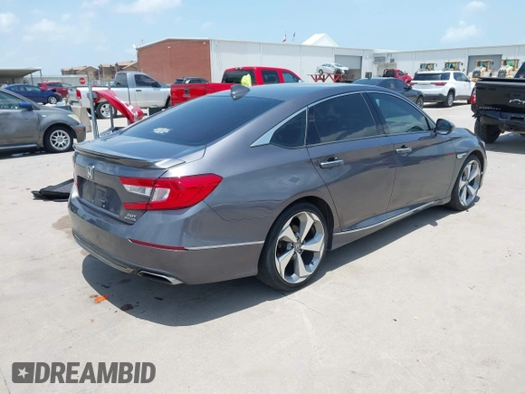 2019 Honda Accord Touring with VIN 1HGCV2F93KA013002, listed as a IAAI auction lot 42519920 with 76,841 mi miles and . Bid and sale history available at DreamBid. Image 4.
