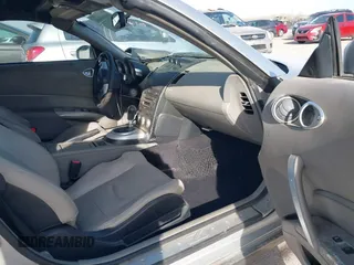 2006 Nissan 350Z Touring z VIN JN1AZ36A56M457175, wystawiony jako IAAI lot #41815565 z przebiegiem 155 869 mil mil oraz . Historia ofert i sprzedaży dostępna na DreamBid. Obrazek 5.