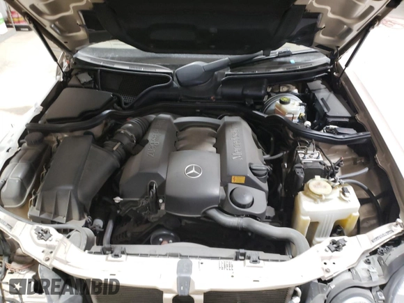 2001 Mercedes-Benz E-Class AWD with VIN WDBJF82J71X043474, listed as a Copart auction lot 45512025 with 59,571 mi miles and Salvage Title. Bid and sale history available at carsss.com. Image 11.