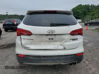 2015 Hyundai Santa Fe z VIN 5XYZWDLA9FG249515, wystawiony jako Copart lot #62689995 z przebiegiem 149 181 mil mil oraz Szkoda całkowita • Salvage title. Historia ofert i sprzedaży dostępna na DreamBid. Obrazek 6.
