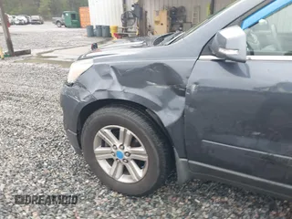 2013 Chevrolet Traverse LT with VIN 1GNKVGKD5DJ130012, listed as a IAAI auction lot 41909148 with 169,485 mi miles and . Bid and sale history available at DreamBid. Image 6.