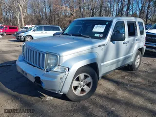 2010 Jeep Liberty Sport with VIN 1J4PN2GK5AW131498, listed as a IAAI auction lot 41099298 with 142,735 mi miles. Bid and sale history available at carsss.com. Image 2.