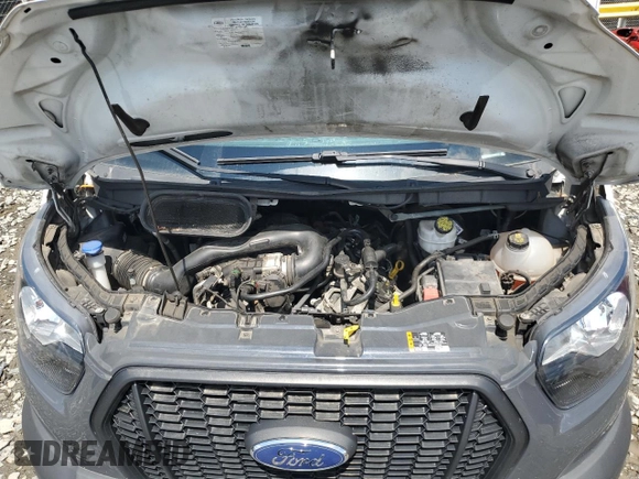 2021 Ford Transit Cargo с VIN 1FTBR1X80MKA26754, выставлен на аукционе Copart как лот 57982185 с пробегом 80 537 миль миль и Списание • Salvage title. История ставок и продаж доступна на DreamBid. Изображение 12.