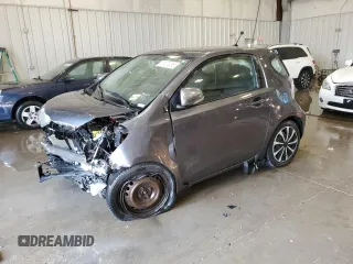 2012 Scion iQ z VIN JTNJJXB07CJ018013, wystawiony jako Copart lot #57101085 z przebiegiem 91 370 mil mil oraz Nie do naprawy • Non repairable. Historia ofert i sprzedaży dostępna na DreamBid. Obrazek 1.