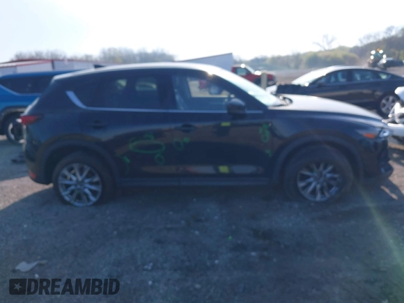 2019 Mazda CX-5 Grand Touring with VIN JM3KFBDM7K0525650, listed as a IAAI auction lot 42032757 with 65,530 mi miles and . Bid and sale history available at DreamBid. Image 14.
