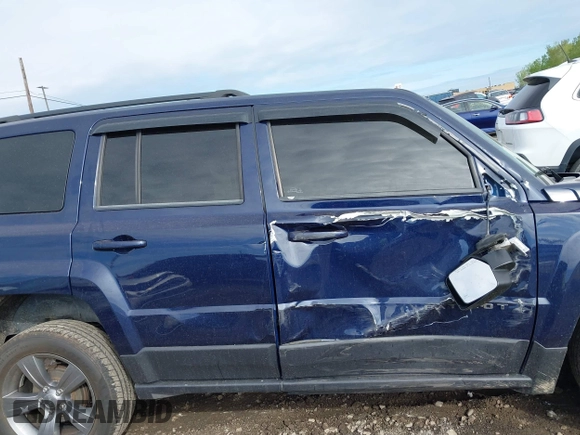 2015 Jeep Patriot High Altitude with VIN 1C4NJPFA9FD428761, listed as a IAAI auction lot 42252498 with 72,271 mi miles and . Bid and sale history available at DreamBid. Image 13.