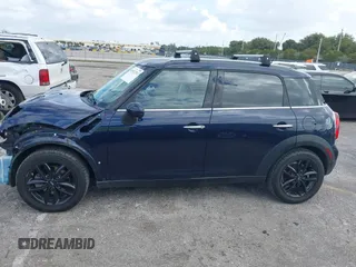 2013 MINI Countryman with VIN WMWZB3C58DWM07817, listed as a IAAI auction lot 41962291 with 60,763 mi miles and . Bid and sale history available at DreamBid. Image 15.