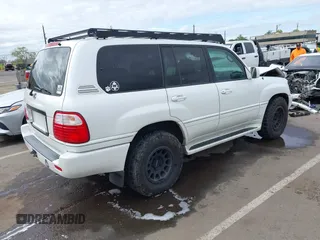 2004 Lexus LX 470 z VIN JTJHT00W043543915, wystawiony jako IAAI lot #41902858 z przebiegiem 110 454 mil mil oraz . Historia ofert i sprzedaży dostępna na DreamBid. Obrazek 4.