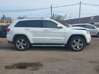 2014 Jeep Grand Cherokee Limited with VIN 1C4RJEBG6EC157551, listed as a IAAI auction lot 42006861 with 159,536 mi miles and . Bid and sale history available at DreamBid. Image 13.
