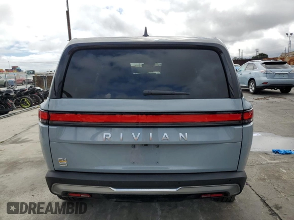 2024 Rivian R1S Adventure with VIN 7PDSGABA7RN038477, listed as a Copart auction lot 48711345 with 0 mi miles and Salvage Title. Bid and sale history available at carsss.com. Image 6.