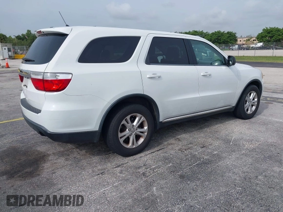 2013 Dodge Durango SXT with VIN 1C4RDHAG1DC669503, listed as a IAAI auction lot 42614210 with 103,482 mi miles and . Bid and sale history available at DreamBid. Image 4.