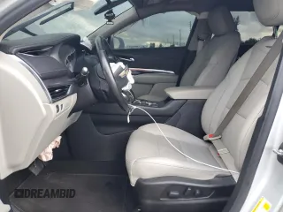 2019 Cadillac XT4 FWD Luxury z VIN 1GYAZAR42KF119510, wystawiony jako Copart lot #48979395 z przebiegiem 57 498 mil mil oraz Szkoda całkowita • Salvage title. Historia ofert i sprzedaży dostępna na DreamBid. Obrazek 7.