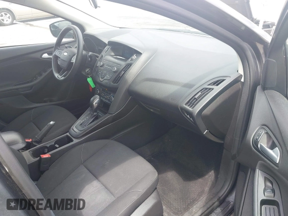 2018 Ford Focus SE with VIN 1FADP3FE2JL263954, listed as a IAAI auction lot 42480748 with 111,059 mi miles and . Bid and sale history available at DreamBid. Image 5.
