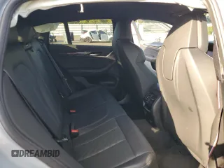 2022 BMW X4 M z VIN 5YM23EC00N9L35827, wystawiony jako Copart lot #87932635 z przebiegiem Nie podano mil oraz Szkoda całkowita • Salvage title. Historia ofert i sprzedaży dostępna na DreamBid. Obrazek 11.