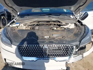 2021 Lincoln Aviator Reserve z VIN 5LM5J7WC6MGL12195, wystawiony jako IAAI lot #42159567 z przebiegiem 95 199 mil mil oraz . Historia ofert i sprzedaży dostępna na DreamBid. Obrazek 10.