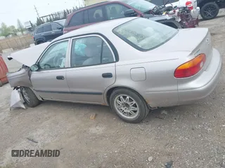 1999 Chevrolet Prizm z VIN 1Y1SK5280XZ445777, wystawiony jako IAAI lot #42138329 z przebiegiem 228 719 mil mil oraz . Historia ofert i sprzedaży dostępna na DreamBid. Obrazek 14.